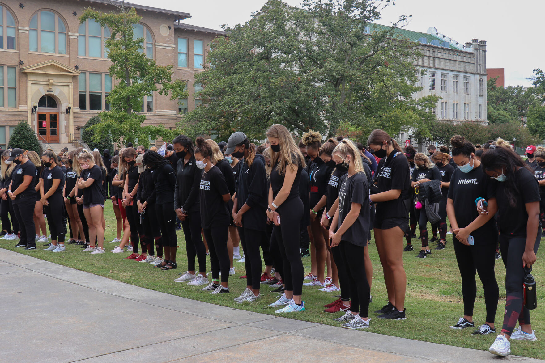 OU Athletes bow their heads for moment of silence